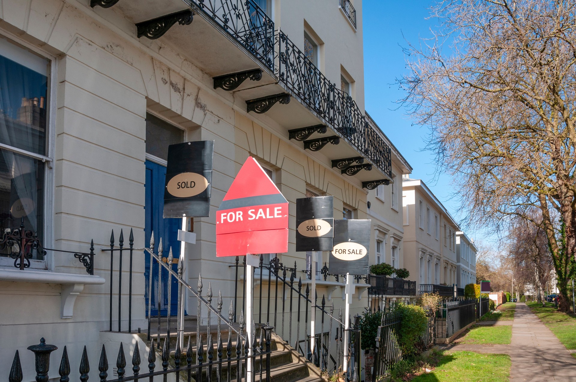 Homes With For Sale Signs Outside